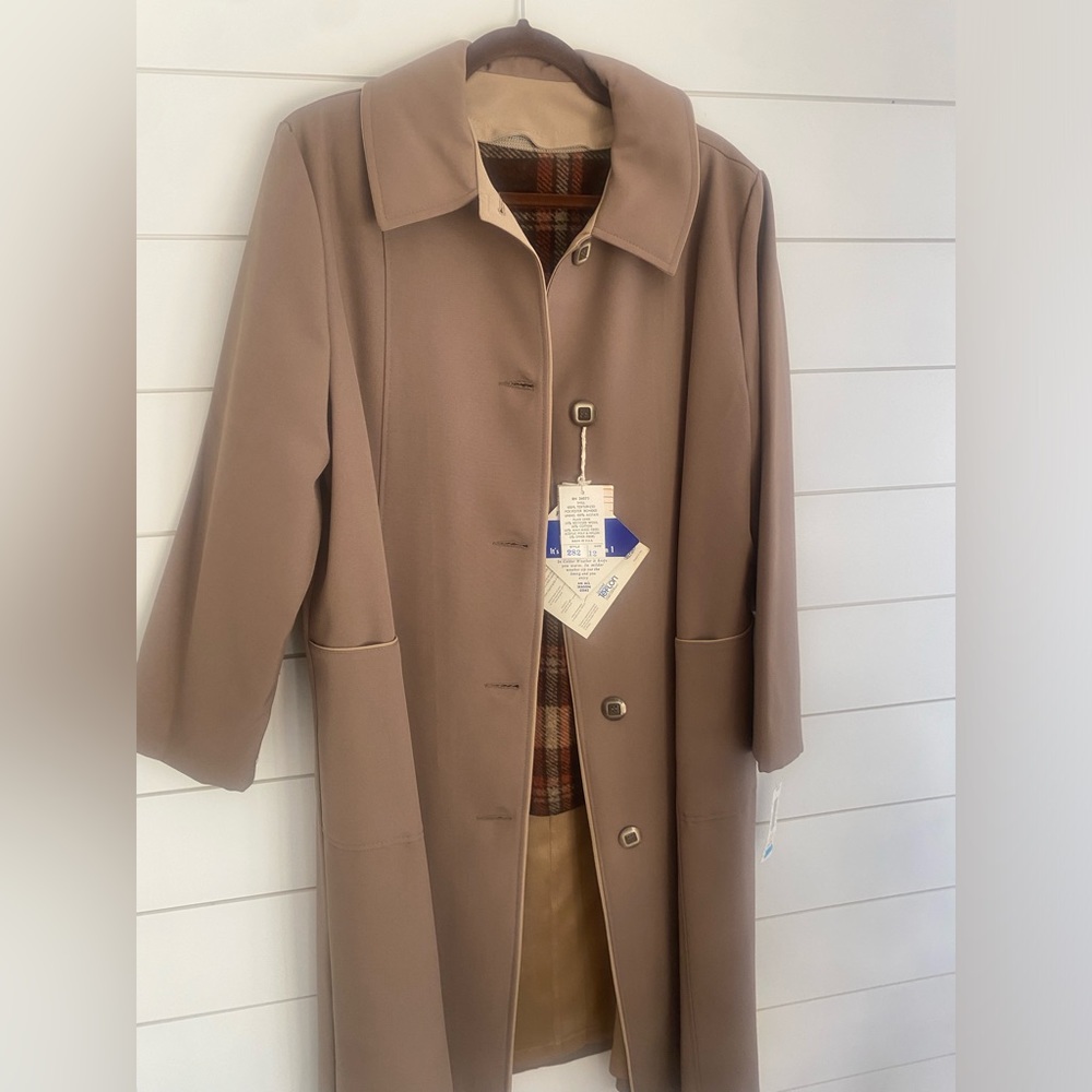 Vintage tan Sears trench coat with zip in lining.